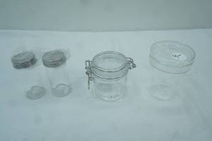 lot 259 image: NEW Small Glass and Plastic Canisters & Jars