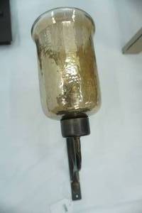 lot 358 image: Uttermost Joselyn Bronze Candle Wall Sconce wTransparent Amber Glass