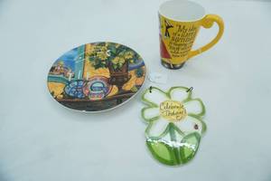 lot 387 image: Collectible Ceramic Pieces. Hallmark Mug, Vista Serena Plate, Celebrate Today Wall Decor