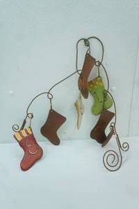 lot 545 image: Believe Christmas Stockings Metal Wall Decor