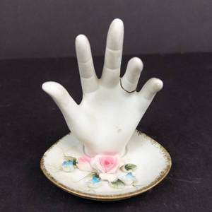 lot 435 image: Porcelain Hand Ring Holder on Floral Plate - White Hand Sculpture