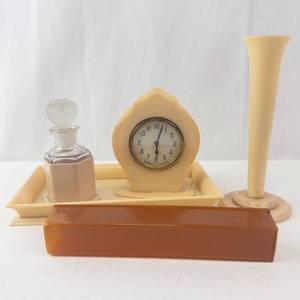 lot 497 image: Desk Set - Celluloid Beige with Clock, Perfume Bottle, Vase & Tray