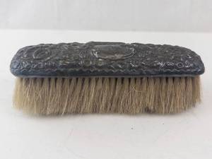 lot 497A image: Sterling Silver Clothes Brush with Ornate Repouss Floral Top - VictorianEdwardian Era