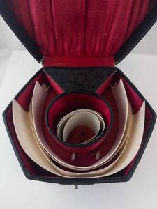lot 502 image: Vintage Hexagonal Hat Box - Black Embossed Exterior, Red Satin Interior w Hat Shaper Inserts