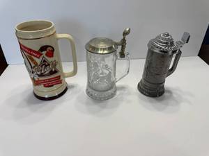 lot 17 image: BLATZ, NFL AND OTHER BEER STEIN