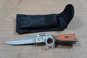 lot 54 image: Gun Shaped Folding Knife
