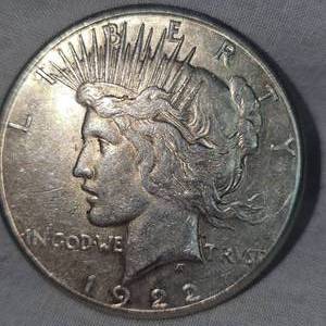 lot 36 image: 1922 S Peace Dollar $1 VG wToning