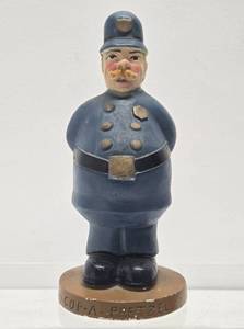 lot 124 image: Old Vintage 1950s era COP-A-PRETZEL Bar Display Statue