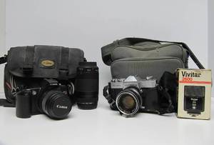 lot 207 image: Yasmica &amp Canon Film Camera wCases &amp Accessories