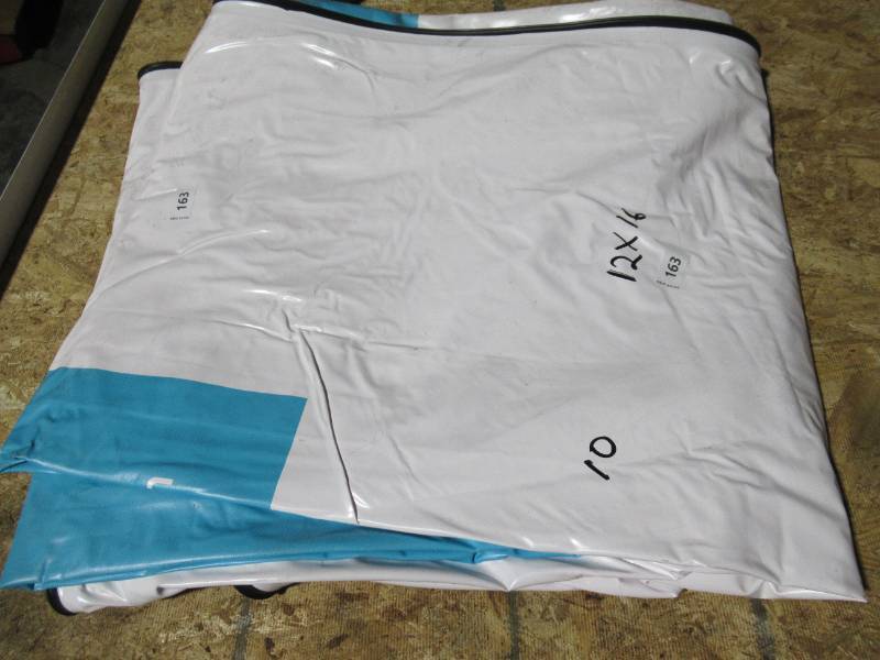 lot 163 image: 12 x 16 18 oz. Black Vinyl Tarp w Advertisement  Reused Billboard  15 mil Heavyweight Duty - A Grade