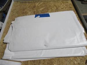 lot 117 image: NEW Vinyl Tarp Remnant - 5 x 65  White  White Vinyl tarp - 13 oz. Midweight Duty