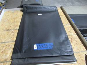 lot 127 image: NEW Vinyl Tarp - 10 x 24  Black  White Vinyl tarp - 8 oz. Lightweight Duty