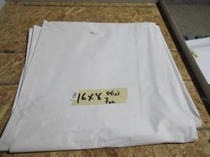 lot 133 image: NEW Vinyl Tarp Remnant - 8 x 16  Black  White Vinyl tarp - 7 oz. Lightweight Duty