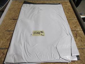 lot 134 image: NEW Vinyl Tarp Remnant - 11 x 16  Black  White Vinyl tarp - 7 oz. Lightweight Duty