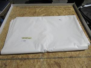 lot 139 image: NEW Vinyl Tarp - 10 x 25  White  White Vinyl tarp - 13 oz. Midweight Duty