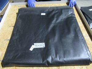 lot 144 image: NEW Vinyl Tarp Remnant - 16 x 39  Black  White Vinyl tarp - 9 oz. Lightweight Duty