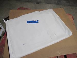 lot 155 image: NEW Vinyl Tarp - 10 x 34  White  White Vinyl tarp - 13 oz. Midweight Duty