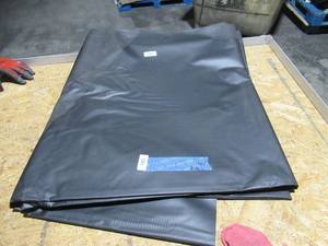 lot 185 image: NEW Vinyl Tarp - 10 x 25  Black  White Vinyl tarp - 13 oz. Midweight Duty