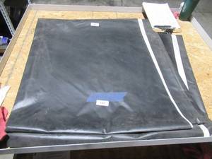 lot 187 image: NEW Vinyl Tarp Remnant - 9 x 41  Black  White Vinyl tarp - 8 oz. Lightweight Duty