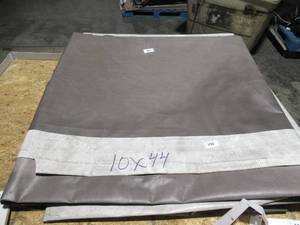 lot 192 image: 10 x 44 13 oz. White Vinyl Tarp w Advertisement  Reused Billboard  11 mil Lightweight Duty