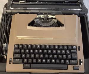 lot 127 image: Sears The Graduate Electric Portable Typewriter with Hard Carrying Case