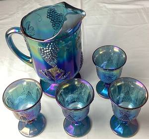 lot 54 image: Indiana Glass Co Harvest Glass Blue Iridescent Carnival Glass Pitcher and Goblets Set