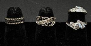 lot 161 image: Collection of 4 Sterling Silver .925 Rings Size 5