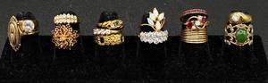 lot 192 image: 14 Gold Tone Rings - Sizes 5.5-8.5