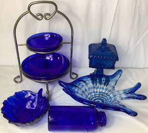 lot 145 image: Beautiful Blue Collection - Blenko Cabbage Leaf Bowl, Godinger 2 Tier Bowl Stand, Jeanette Pedestal Covered Dish, Murano Style Fish Bowl and Cobalt Blue Jar
