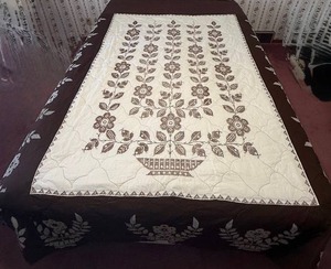lot 51 image: Handmade Full Size Cream and Brown Cross Stitch Flower Quilt