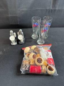 lot 92 image: Planet Hollywood Glasses, Marble Cactus Bookends, and Mixed Napkin Ring Lot