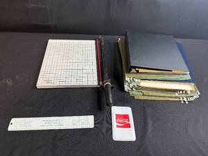lot 103 image: Assorted Office Supplies Including Paper Trimmer, Hanging File Folders, Ruler, and Coca-Cola Card Holder