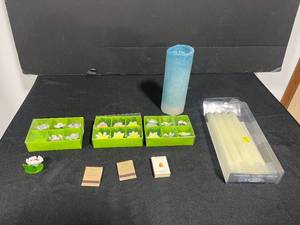 lot 177 image: Lot of Enesco Porcelain Flower FigurinesPlace Markers, Matchbooks, Blue Pillar Candle, and Taper Candles