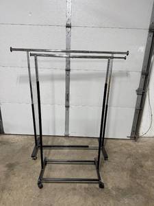lot 216 image: Set of 2 Adjustable Chrome Clothing Racks on Wheels
