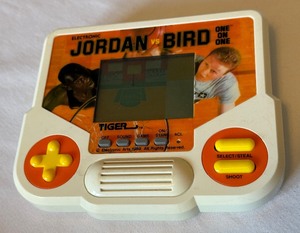 lot 26A image: Jordan vs. Bird One on One Handheld Electronic Basketball Game - Michael Jordan