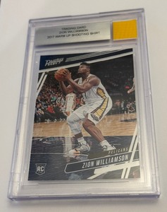 lot 48 image: Zion Williamson 2017 Warm Up Shooting Shirt RC Beckett 2019-20 Chronicles Prestige #60 Rookie Basketball Card