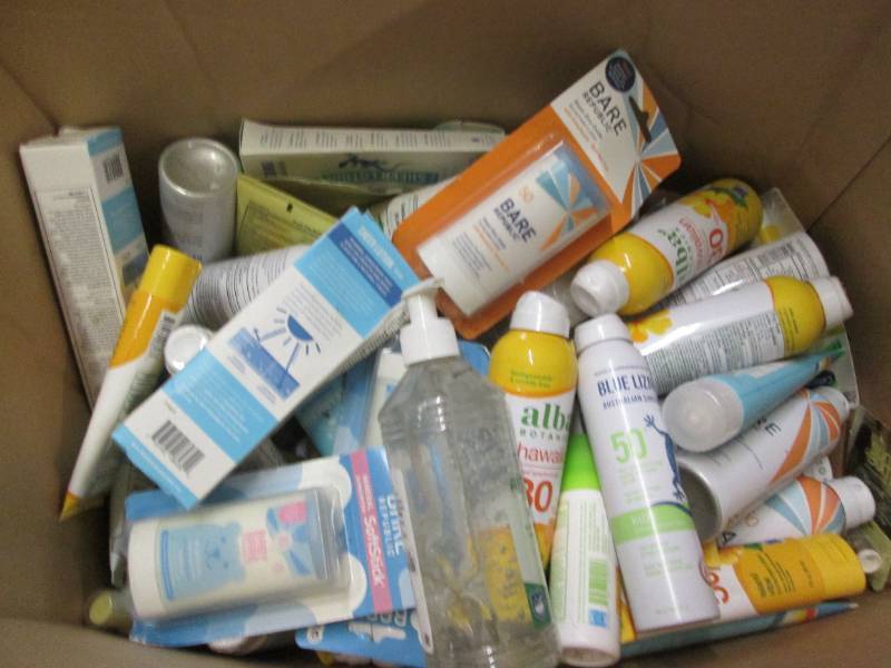 lot 267 image: Box of sunscreen and other health a...