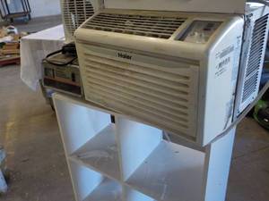 lot 57 image: Wood Shelf, Battery Charger, Peloni...