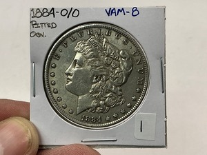 lot 1 image: 1884-OO Morgan Silver Dollar