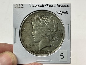 lot 5 image: 1922 Triple-Die Reverse Peace Silver Dollar