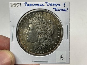 lot 15 image: 1887 Morgan Silver Dollar