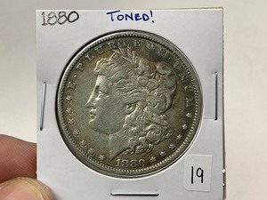 lot 19 image: 1880 Morgan Silver Dollar