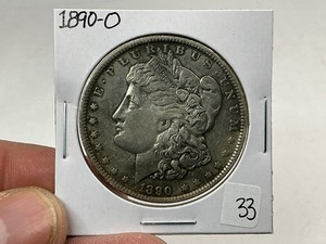 lot 33 image: 1890-O Morgan Silver Dollar