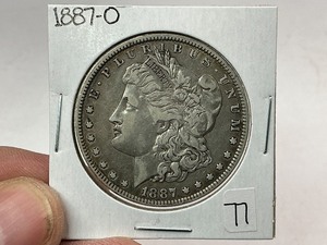 lot 77 image: 1887-O Morgan Silver Dollar