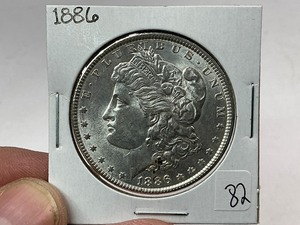 lot 82 image: 1886 Morgan Silver Dollar