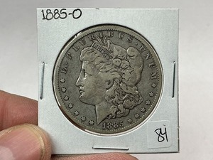 lot 84 image: 1885-O Morgan Silver Dollar