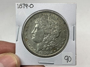 lot 90 image: 1879-O Morgan Silver Dollar