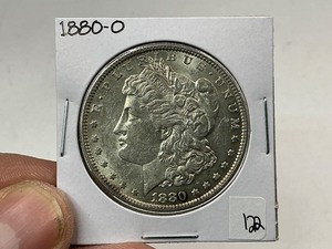 lot 122 image: 1880-O Morgan Silver Dollar