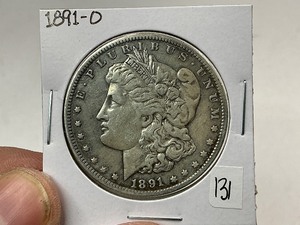 lot 131 image: 1891-O Morgan Silver Dollar