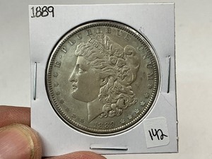 lot 142 image: 1889 Morgan Silver Dollar